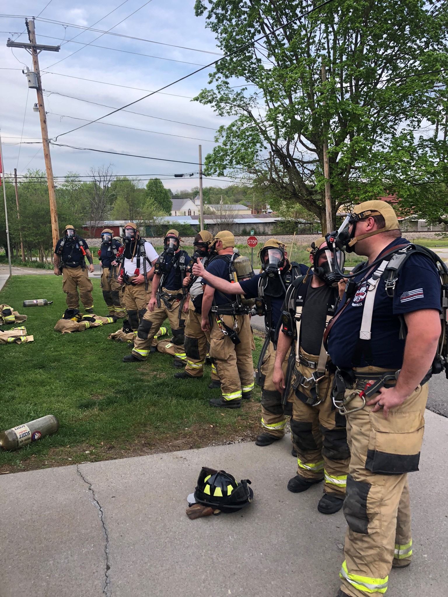 several white pine fire department fire fighters lined up for a drill
